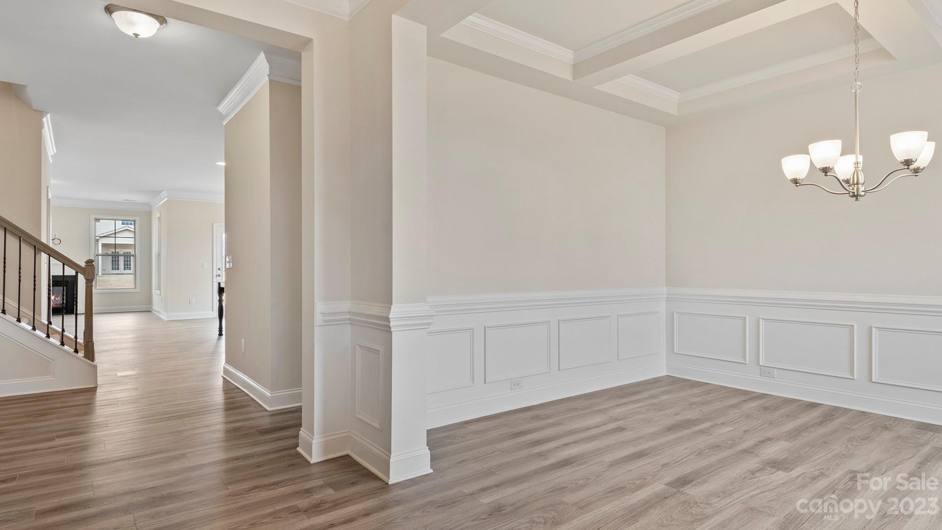 245 Fox Cove Road Hendersonville, NC 28792 - Photo 4 of 33 a view of an empty room with wooden floor