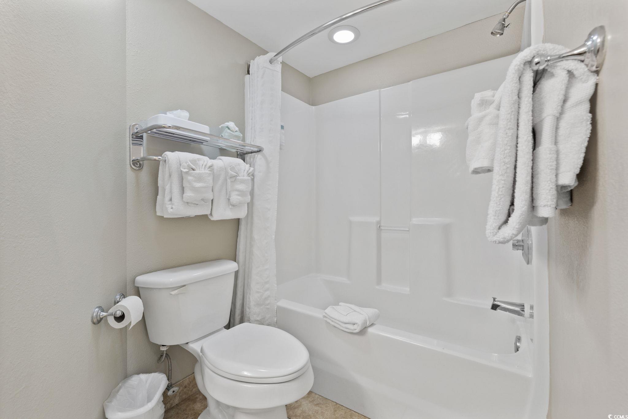 5200 North Ocean Boulevard, Unit 857 Myrtle Beach, SC 29577 - Photo 18 of 40 Bathroom with shower / tub combo and toilet