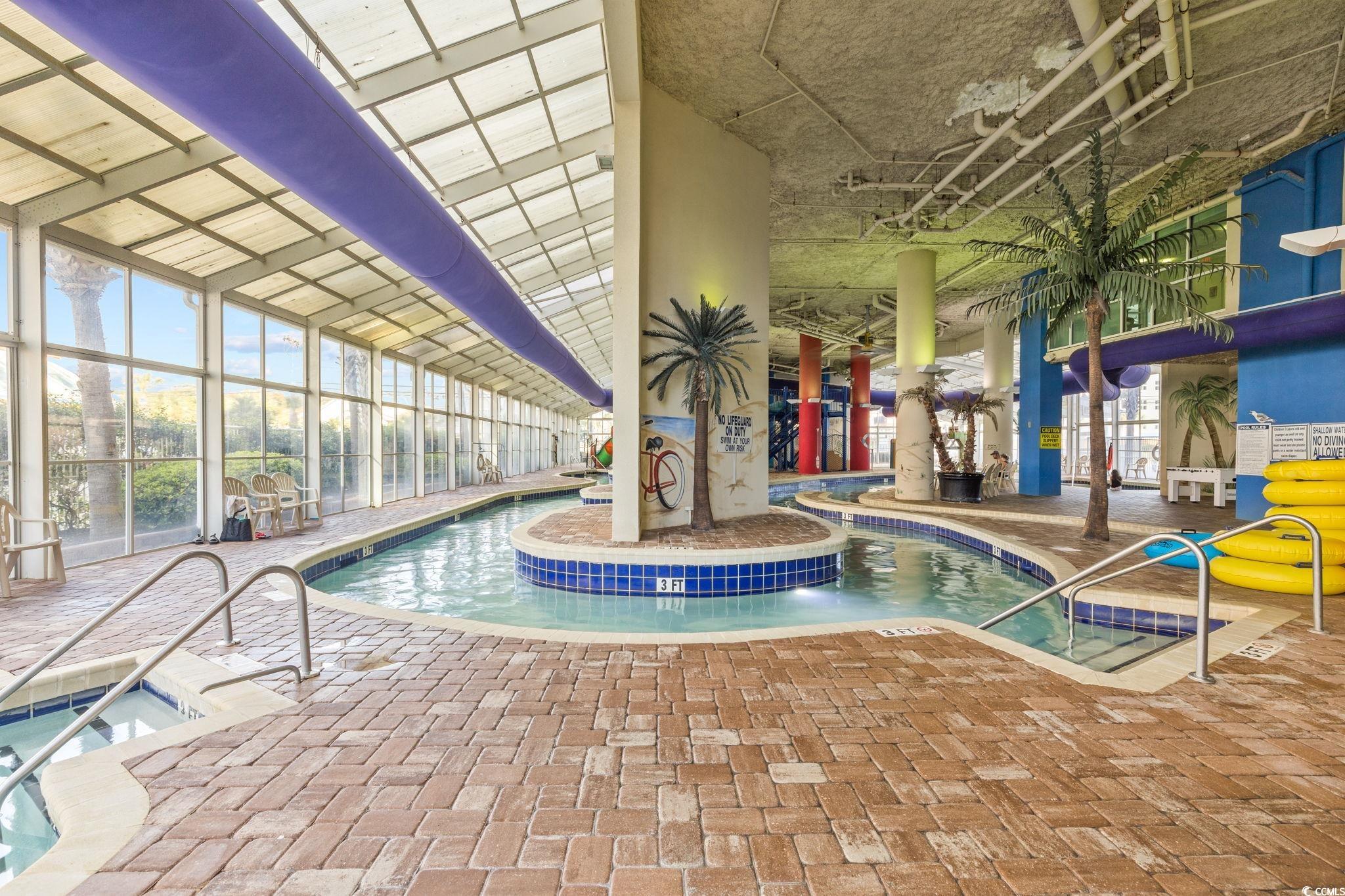 5200 North Ocean Boulevard, Unit 857 Myrtle Beach, SC 29577 - Photo 30 of 40 Indoor pool with a patio area and a community hot tub
