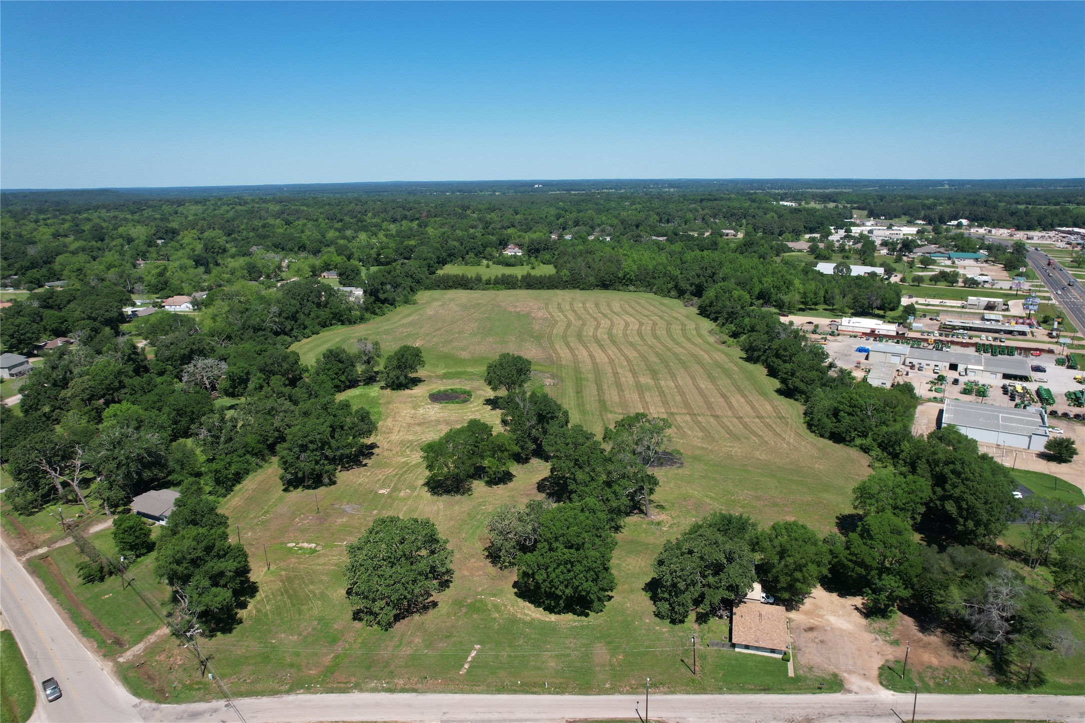 304 East / Joe Kale Road Crockett, TX 75835 - Photo 5 of 21 an aerial view of a residential houses with outdoor space and trees