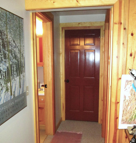 6210 Mountain View Road, Unit 133 Coalville, UT 84017 - Photo 61 of 87 The lower level hallway to the bath, bunk room and utility room.