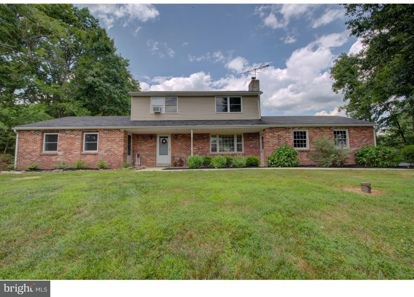 1397 Valley View Road Pottstown, PA 19465 - Photo 1 of 25 a front view of house with yard and green space
