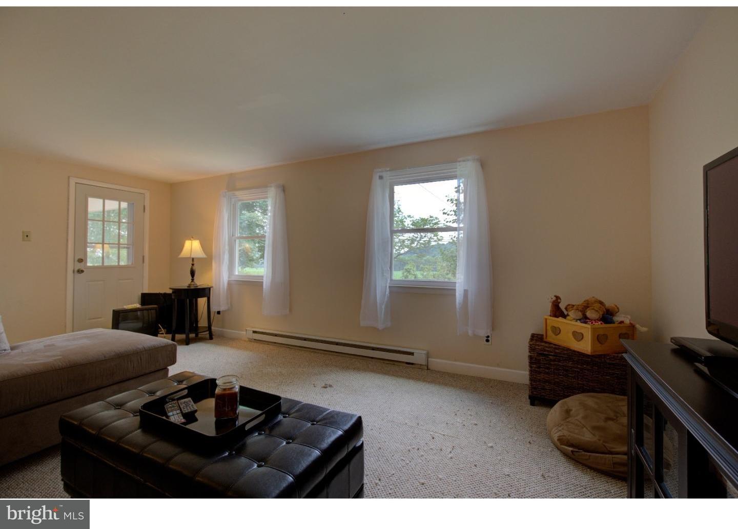 1397 Valley View Road Pottstown, PA 19465 - Photo 12 of 25 a living room with furniture and a window