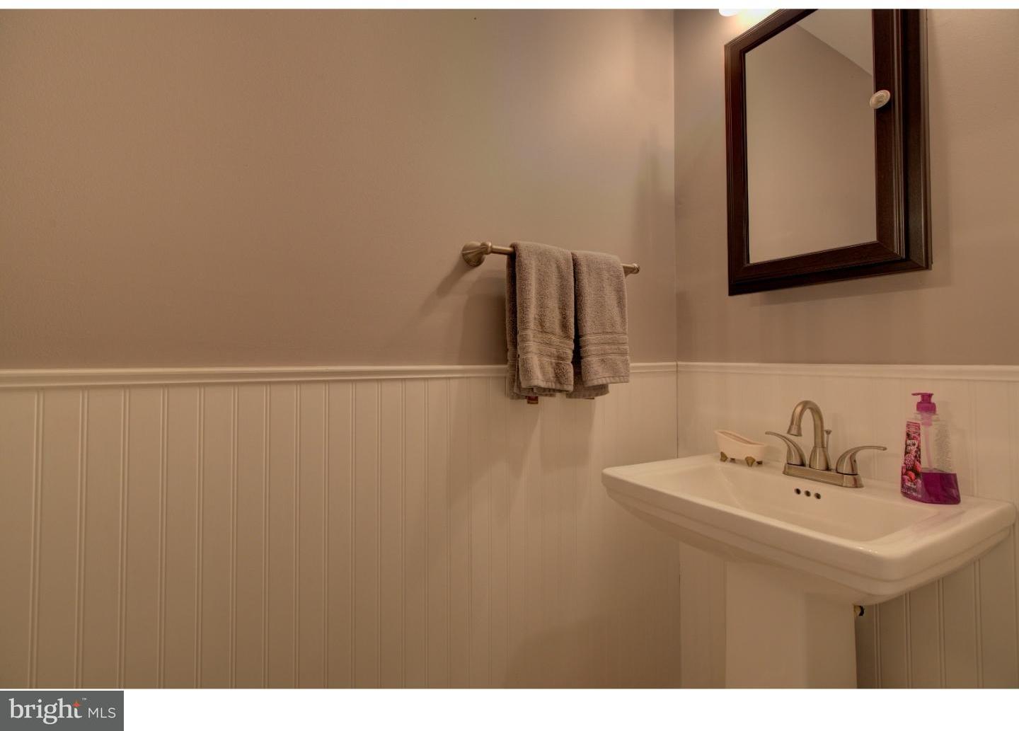 1397 Valley View Road Pottstown, PA 19465 - Photo 13 of 25 a bathroom with a sink and a mirror