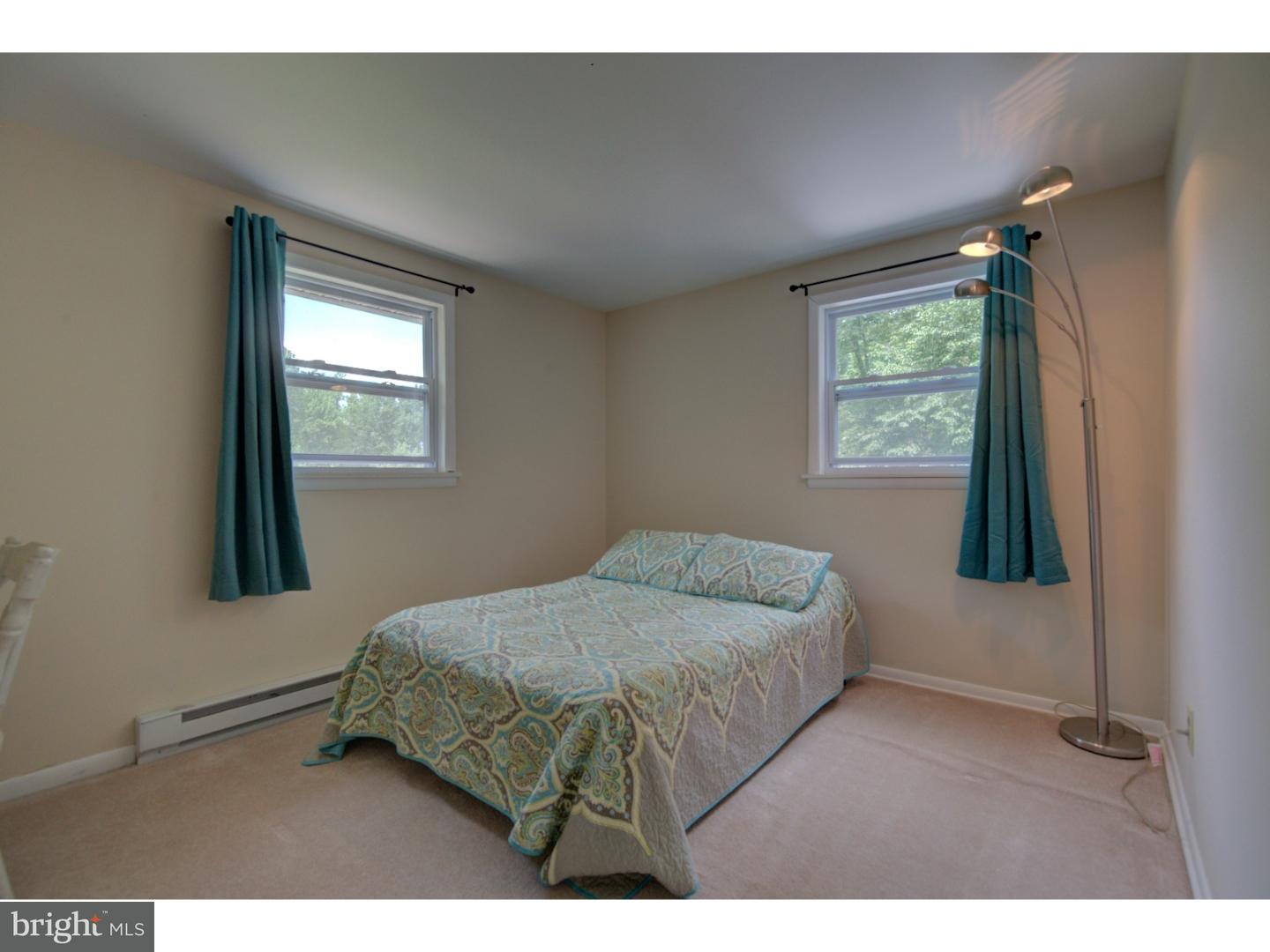 1397 Valley View Road Pottstown, PA 19465 - Photo 15 of 25 a bedroom with a bed and a window