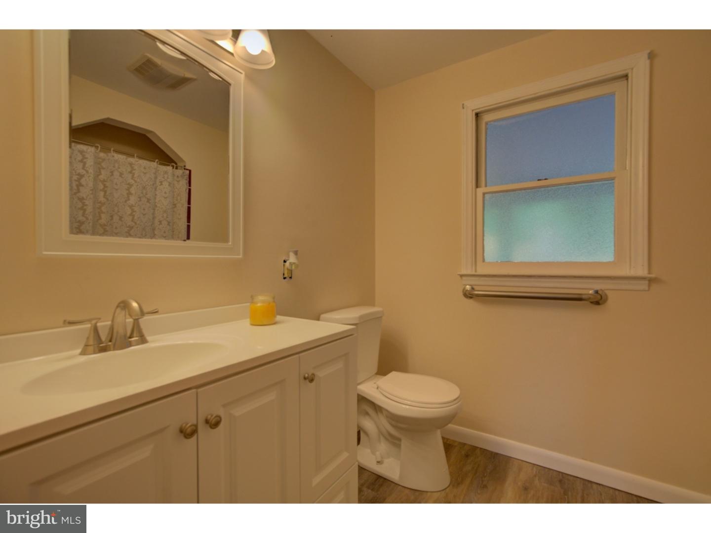 1397 Valley View Road Pottstown, PA 19465 - Photo 18 of 25 a bathroom with a sink and a toilet