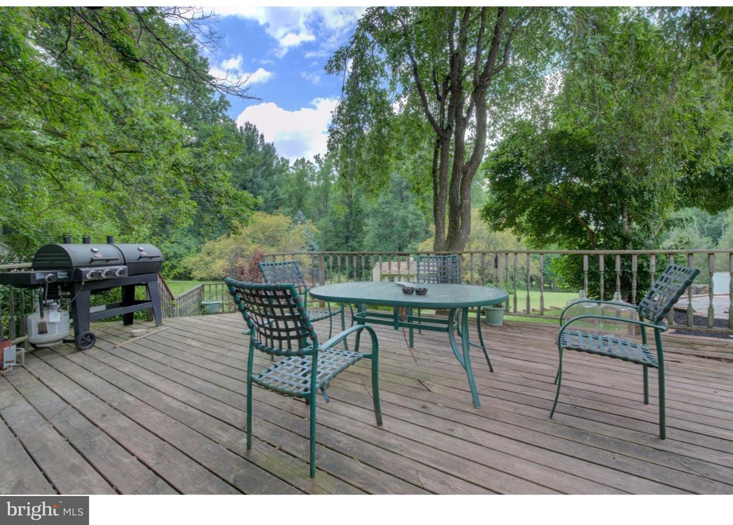 1397 Valley View Road Pottstown, PA 19465 - Photo 23 of 25 a view of a chairs and table on the wooden deck