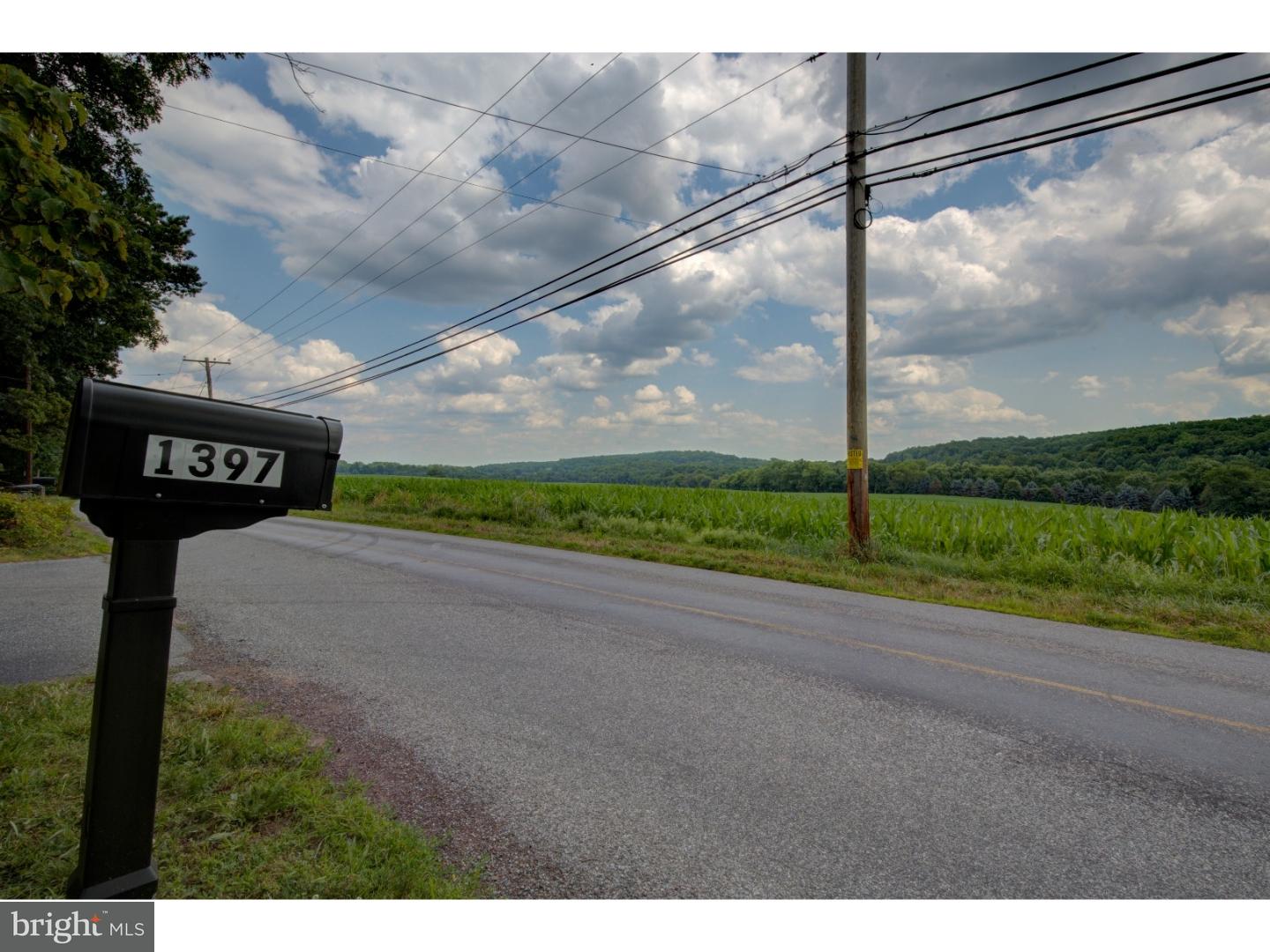 1397 Valley View Road Pottstown, PA 19465 - Photo 25 of 25 a view of a street with a big yard