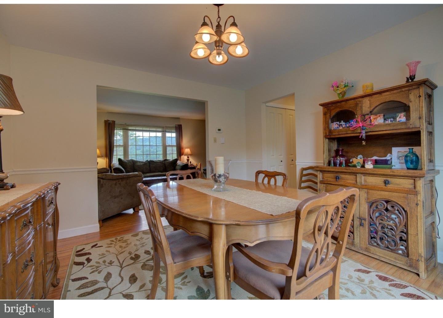 1397 Valley View Road Pottstown, PA 19465 - Photo 7 of 25 a view of a dining room with furniture and a chandelier