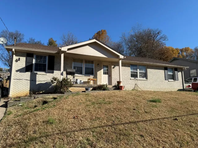 a front view of a house with patio