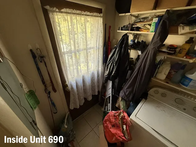 a view of balcony with furniture