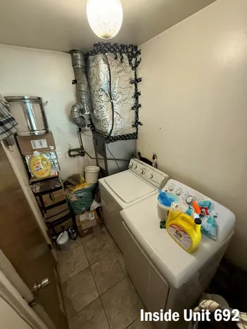 a bathroom with a shower and a sink