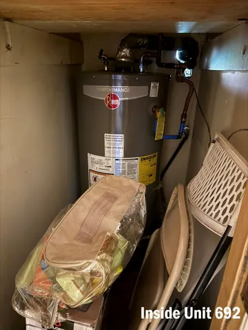 a bed room with a bed and a television