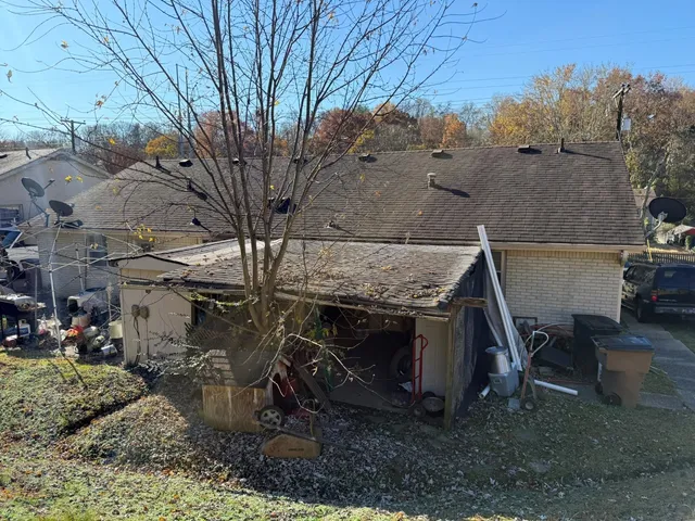 a aerial view of a house with patio