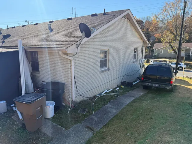 a view of a back yard of the house