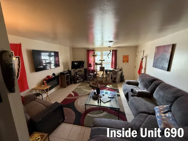 a kitchen with sink cabinets and appliances