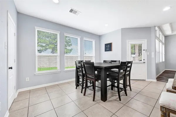 a view of a dining room with furniture