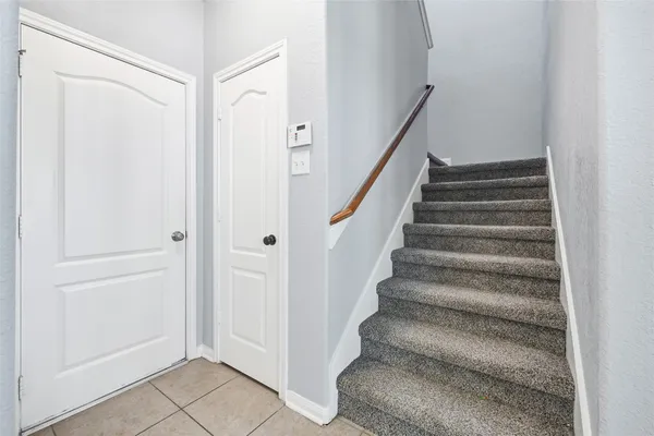 a view of an entryway with staircase