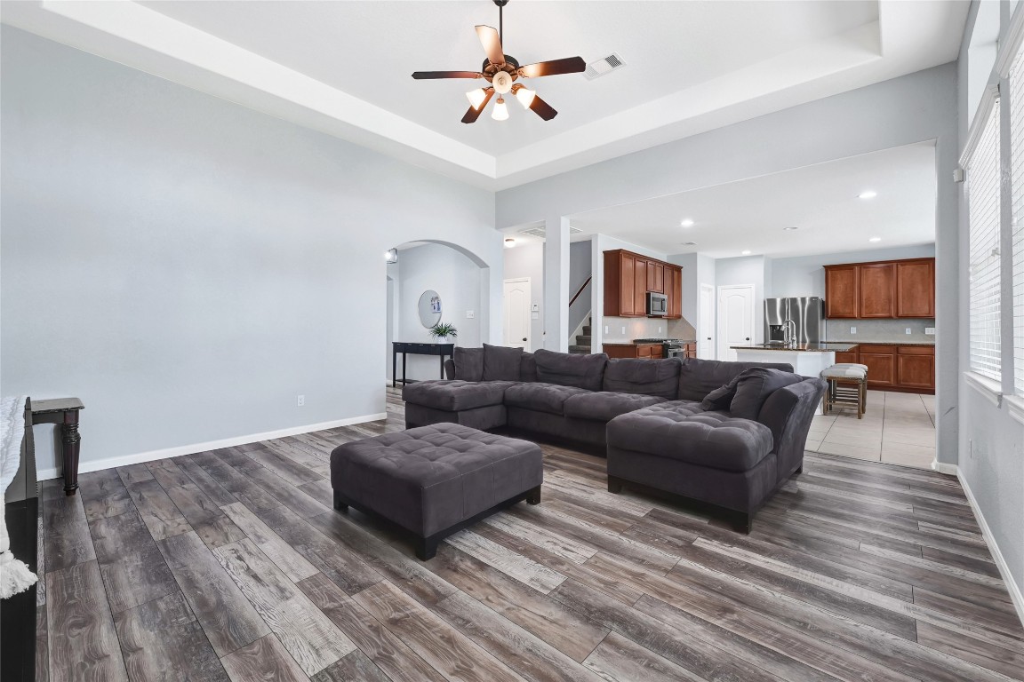 1501 Kent Valley Lane Rosenberg, TX 77471 - Photo 21 of 27 a living room with furniture and a wooden floor