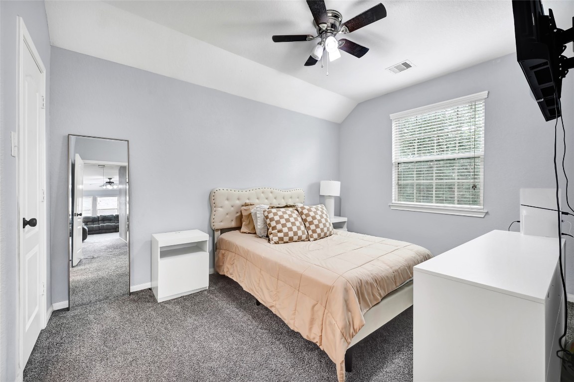 1501 Kent Valley Lane Rosenberg, TX 77471 - Photo 24 of 27 a bedroom with a bed and window