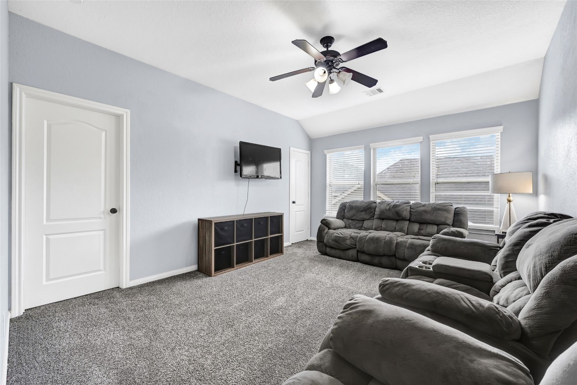 1501 Kent Valley Lane Rosenberg, TX 77471 - Photo 27 of 27 a living room with furniture and a ceiling fan