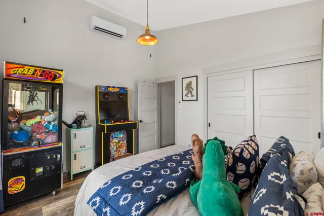 a bedroom with a bed and furniture