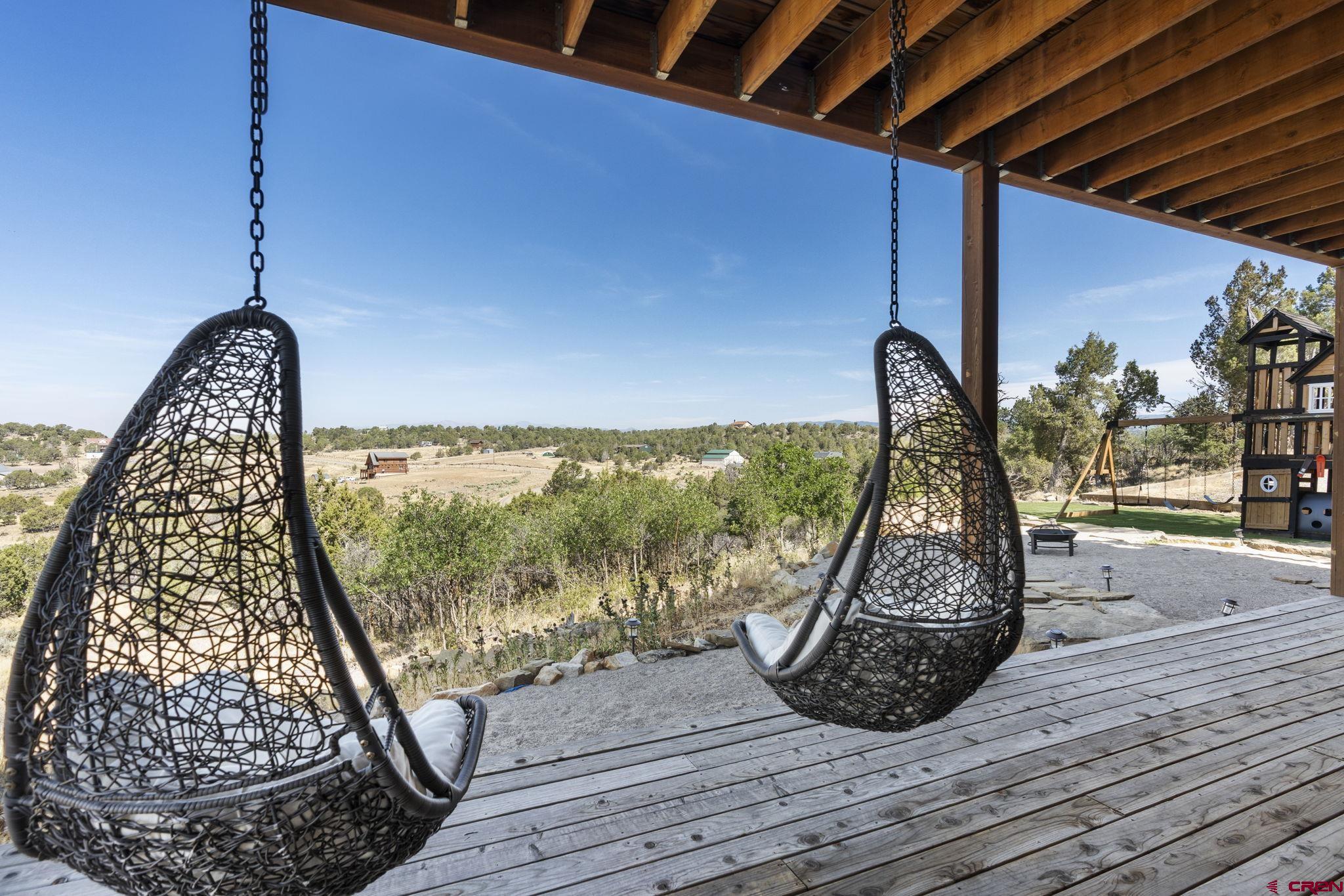 68 Cody Road Durango, CO 81303 - Photo 37 of 45 a view of a floor to ceiling window and wooden floor