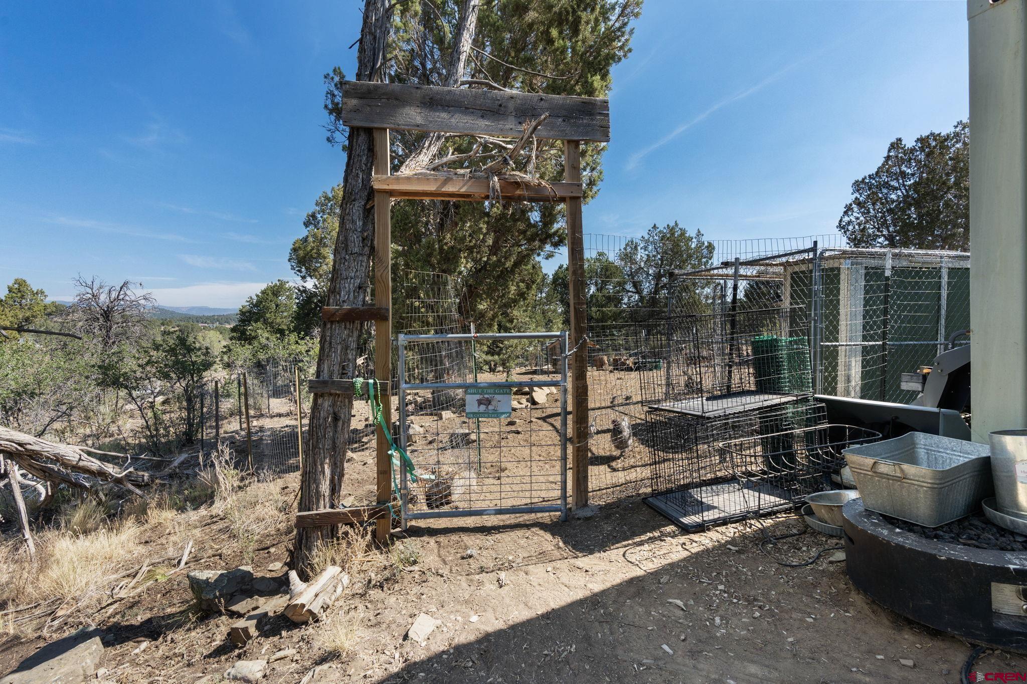 68 Cody Road Durango, CO 81303 - Photo 40 of 45 a view of a chair and table in backyard