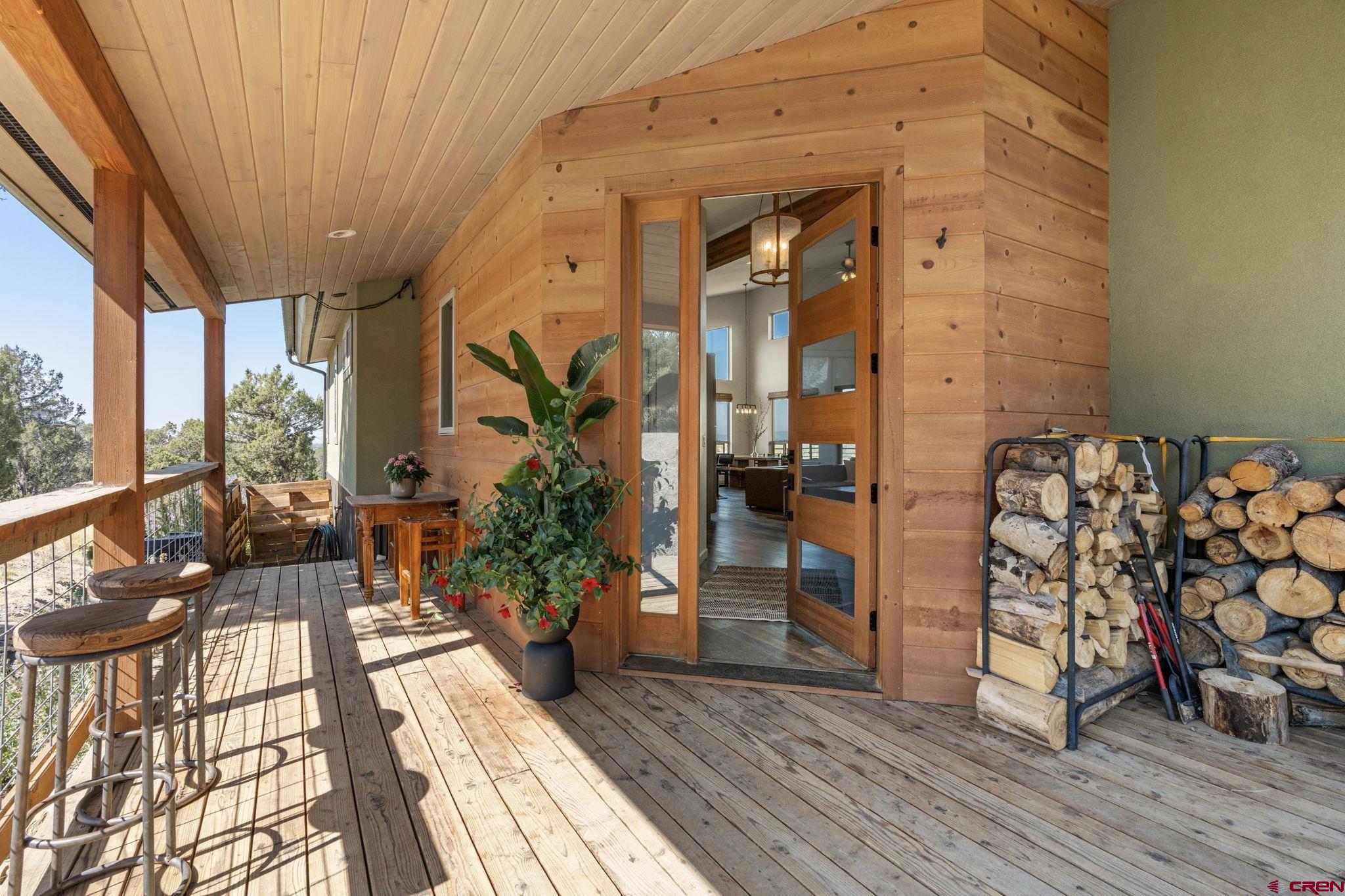 68 Cody Road Durango, CO 81303 - Photo 43 of 45 a living room with furniture and wooden floor