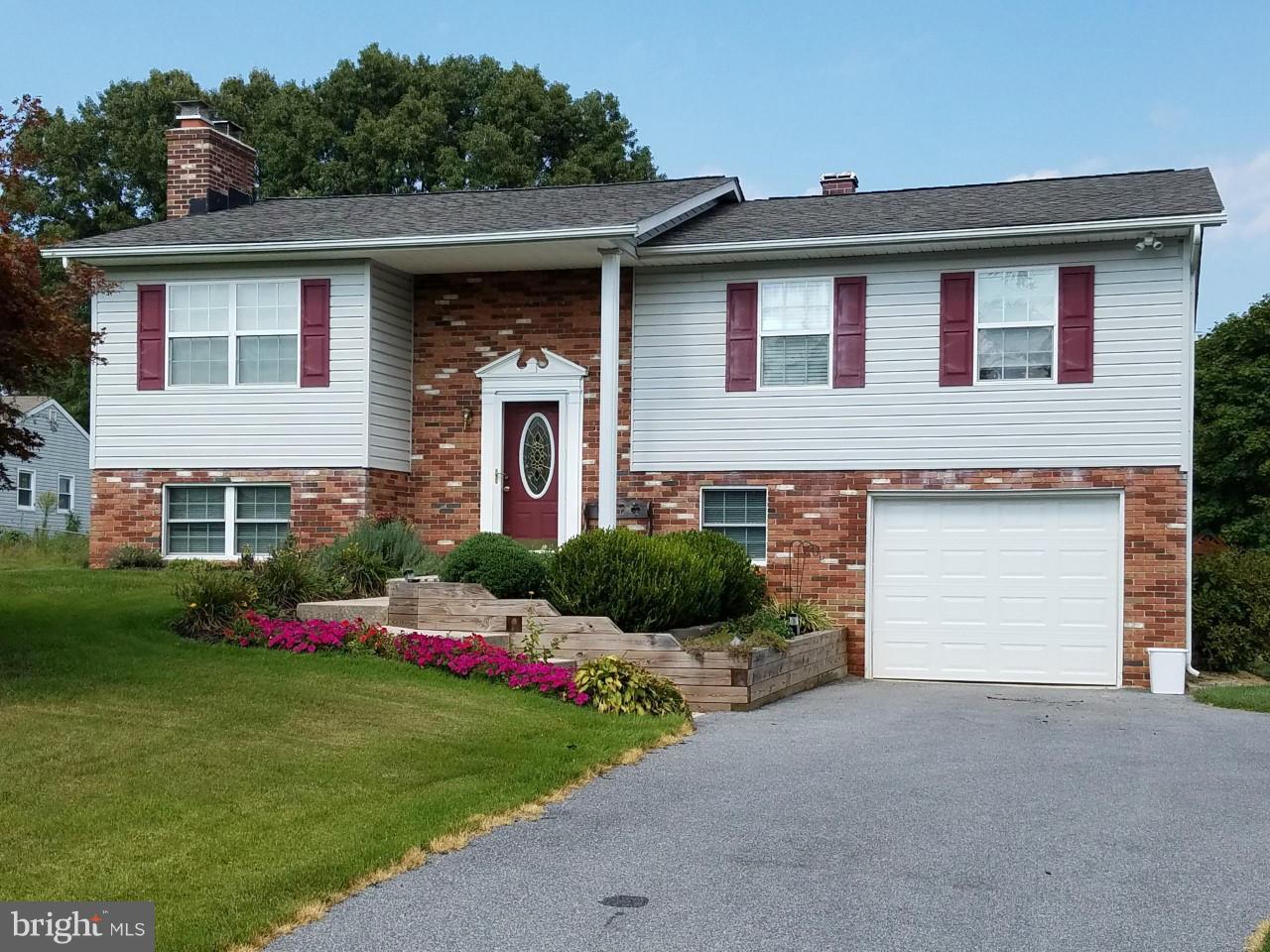 a front view of house with yard
