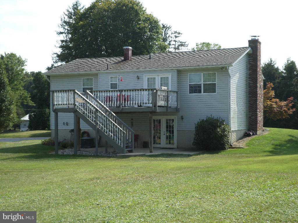 2520 Neudecker Road Westminster, MD 21157 - Photo 22 of 27 a front view of a house with a garden