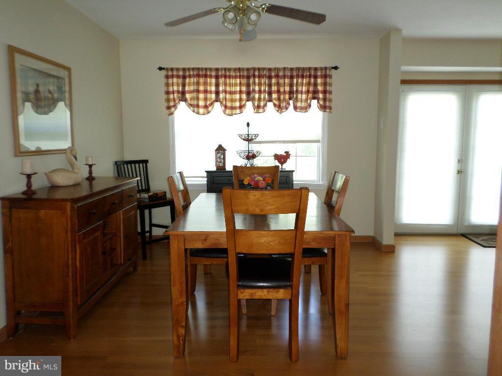 2520 Neudecker Road Westminster, MD 21157 - Photo 4 of 27 a view of a dining room with furniture and window