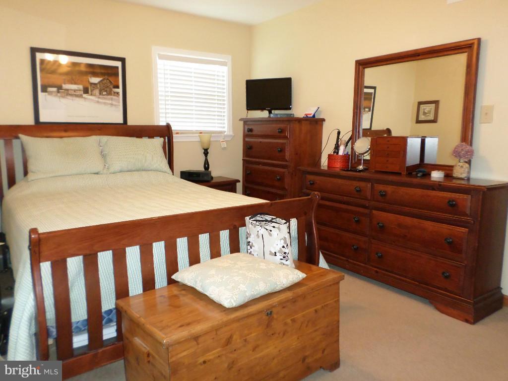2520 Neudecker Road Westminster, MD 21157 - Photo 9 of 27 a bedroom with a bed and furniture