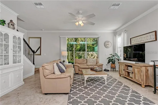 an aerial view of residential house with outdoor space and swimming pool