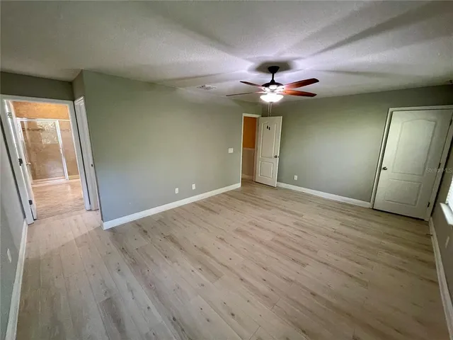 a view of a city with mountains in the background