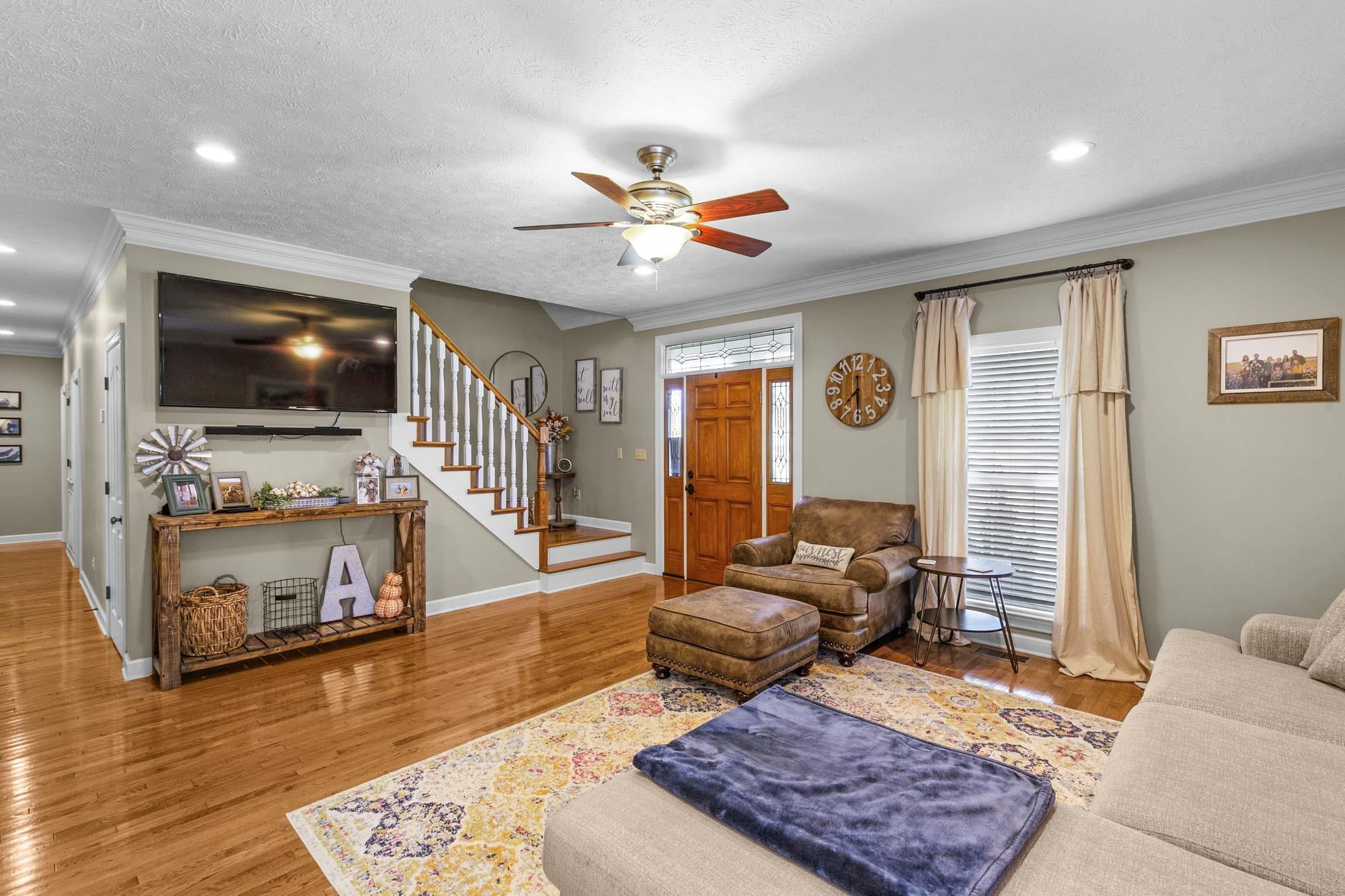 335 Booth Loop Henderson, TN 38340 - Photo 3 of 20 a living room with furniture and a flat screen tv