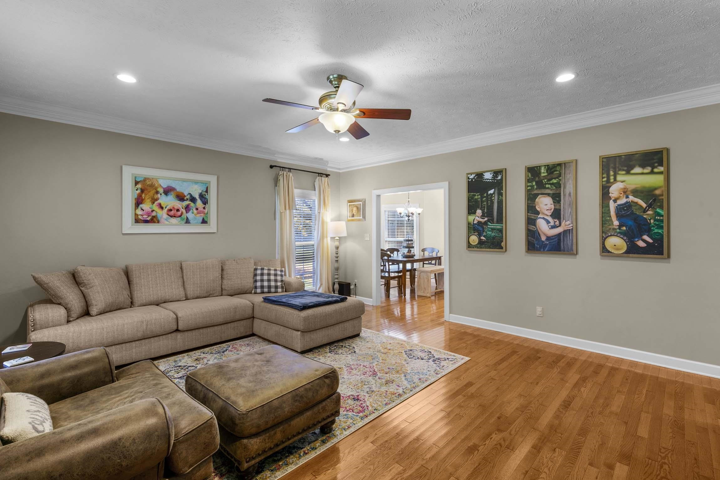 335 Booth Loop Henderson, TN 38340 - Photo 4 of 20 a living room with furniture and wooden floor