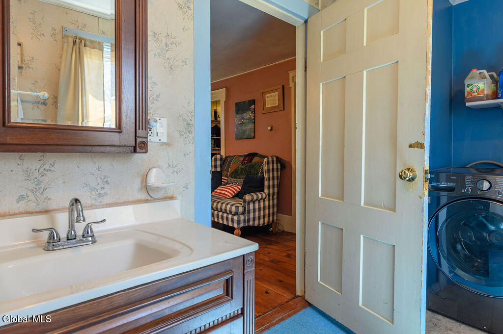 1483 County Rte 49 Argyle, NY 12809 - Photo 15 of 31 bathroom with washer/dryer