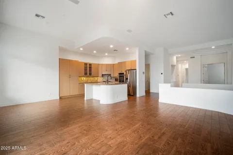 a view of a town with mountains in the background