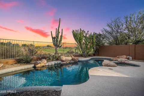 an empty room with windows and entrance