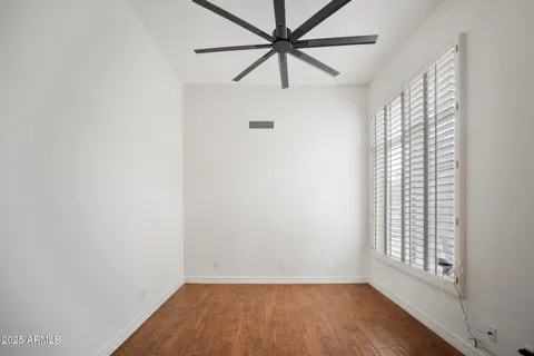 a view of a swimming pool with outdoor seating