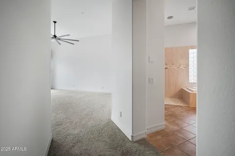 a view of a patio with table and chairs potted plants with wooden floor