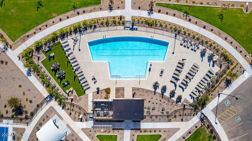 10038 West Piccadilly Road Avondale, AZ 85392 - Photo 4 of 18 an aerial view of a house with a garden and swimming pool