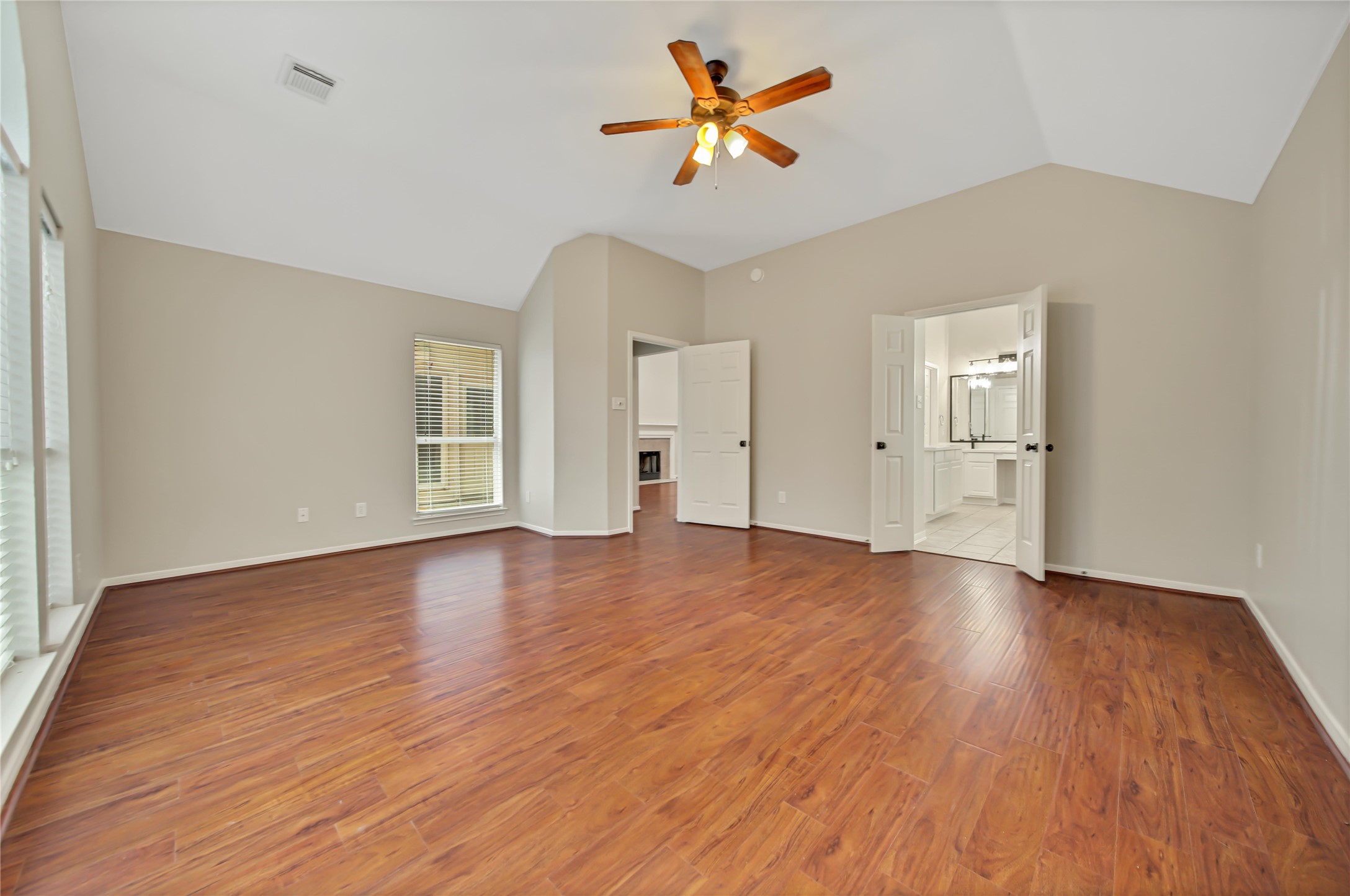 14526 Red Tailed Hawk Lane Houston, TX 77044 - Photo 20 of 40 wooden floor in an empty room with a window