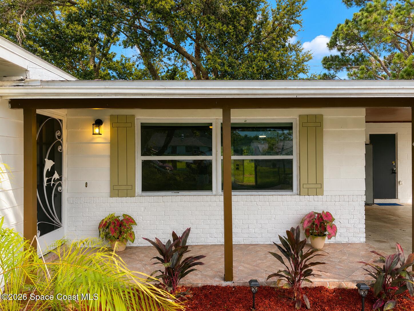 987 Kings Post Road Rockledge, FL 32955 - Photo 2 of 30 a view of a two chairs in the balcony