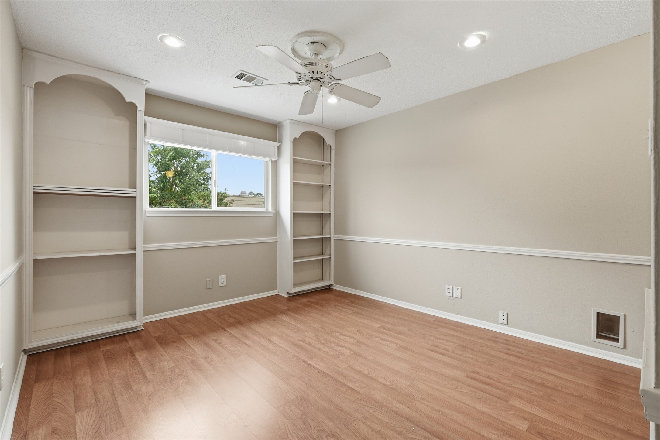 8310 Mentmore Drive Spring, TX 77379 - Photo 43 of 47 Another spacious secondary bedroom offers comfort, privacy, and abundant natural light.