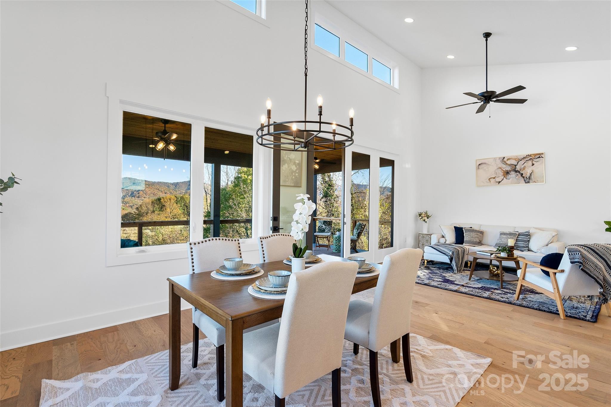 872 Newfound Road Canton, NC 28716 - Photo 14 of 44 a view of a dining room with furniture window and outside view