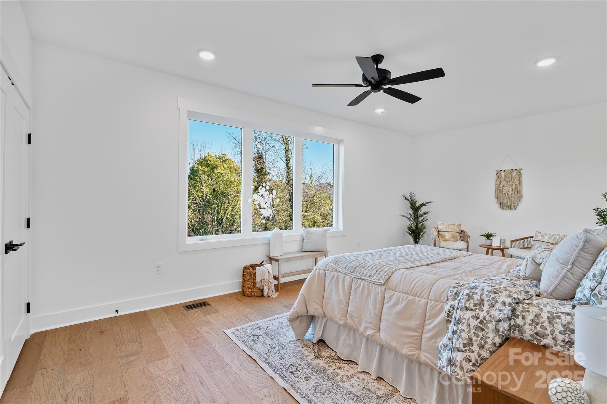 872 Newfound Road Canton, NC 28716 - Photo 20 of 44 a bedroom with a bed and a window