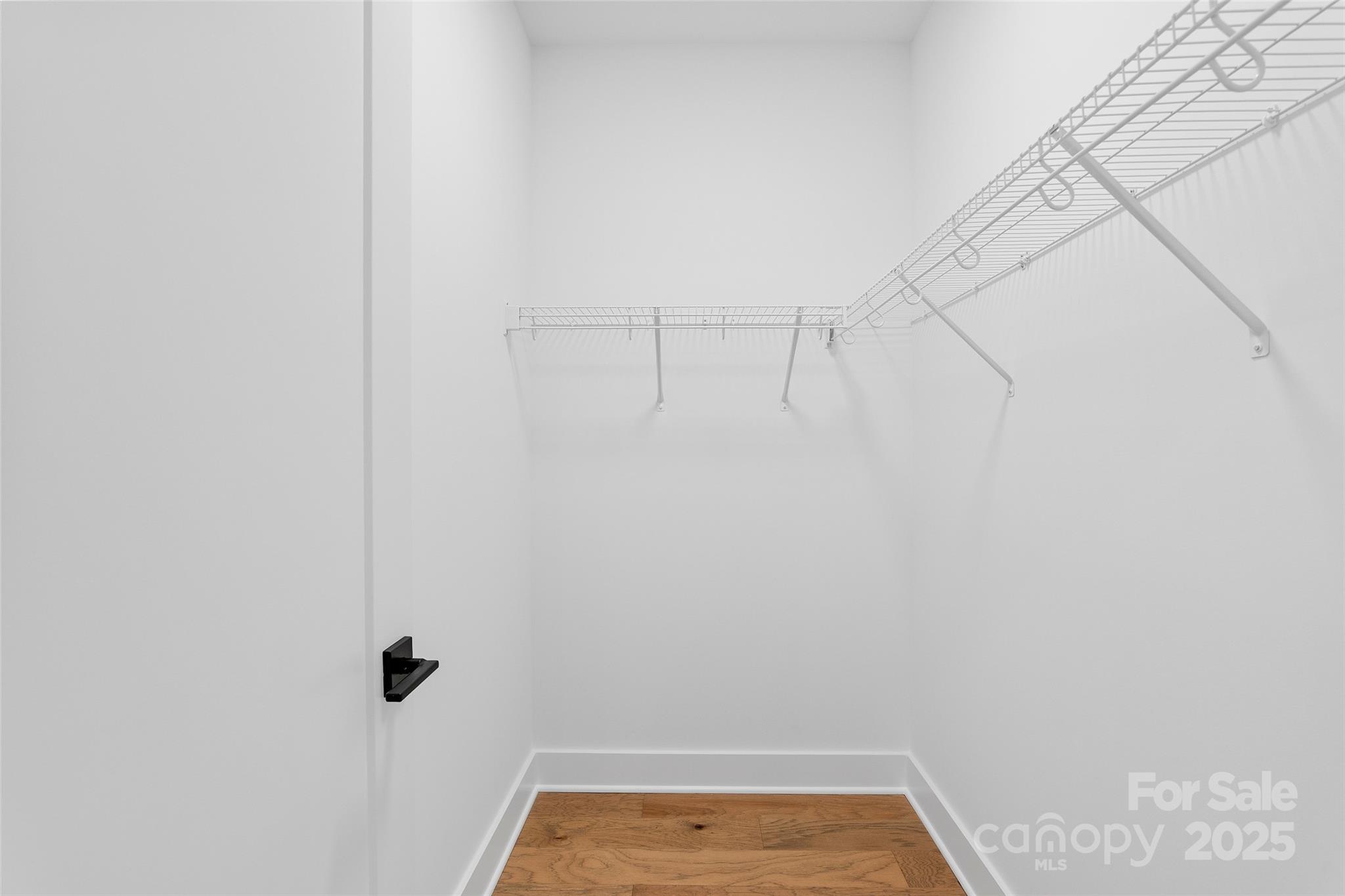 872 Newfound Road Canton, NC 28716 - Photo 24 of 44 a view of small space with empty racks on the wall