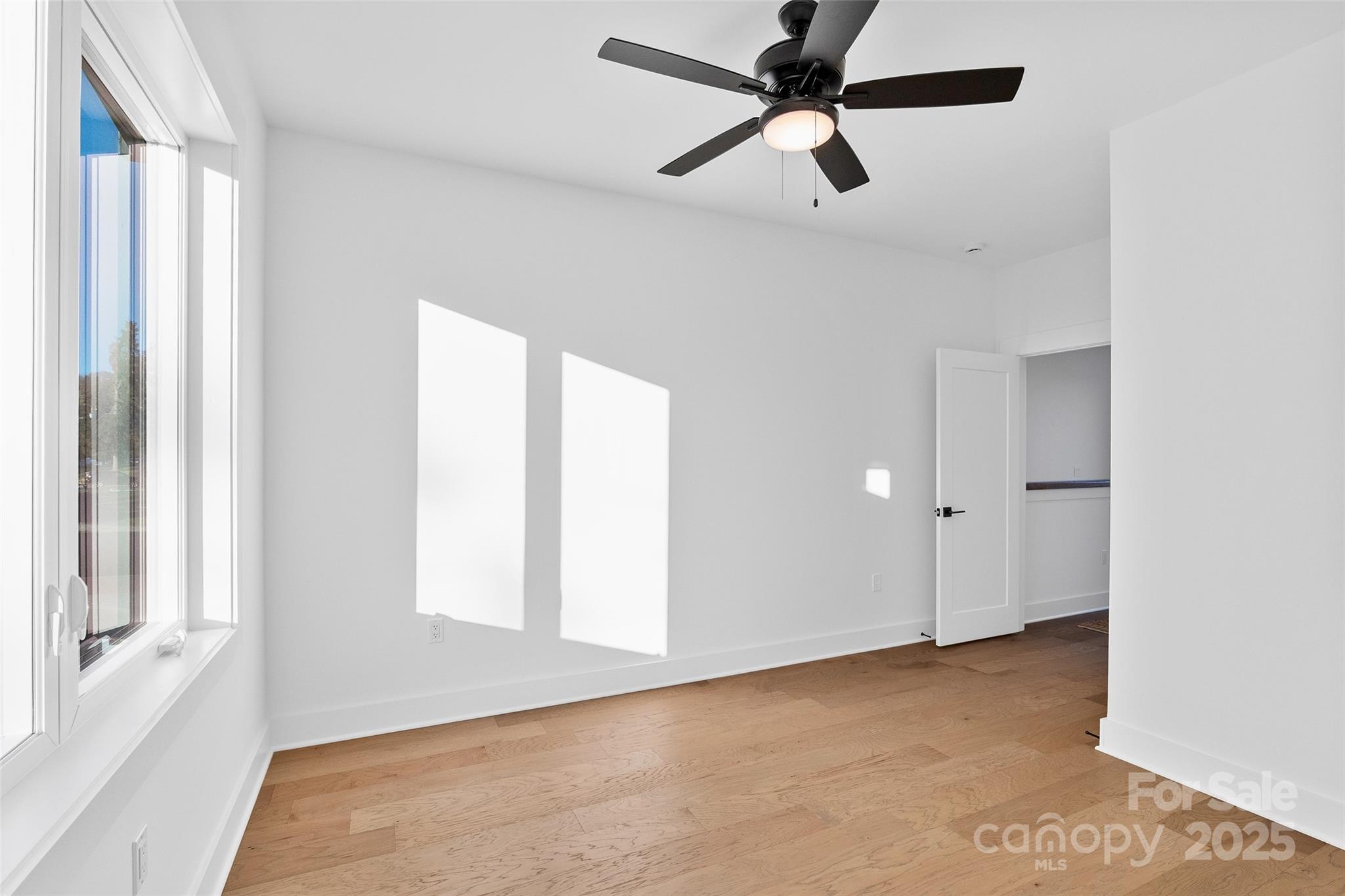 872 Newfound Road Canton, NC 28716 - Photo 35 of 44 a view of an empty room with a window